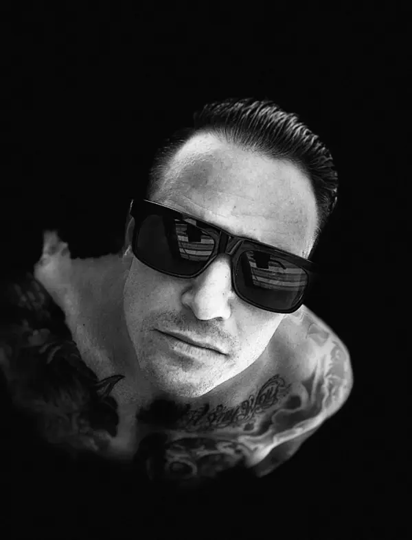 Michael Jannicelli in a black-and-white portrait wearing sunglasses